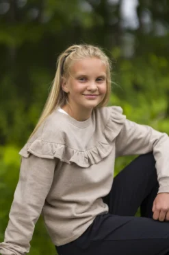 Genser med volanger